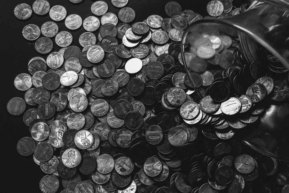 Pile of coins image used for financial alchemy by Thomas Stray